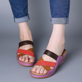 Hole-crossing open-toe wedge slippers