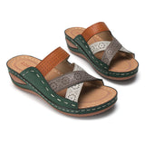 Hole-crossing open-toe wedge slippers